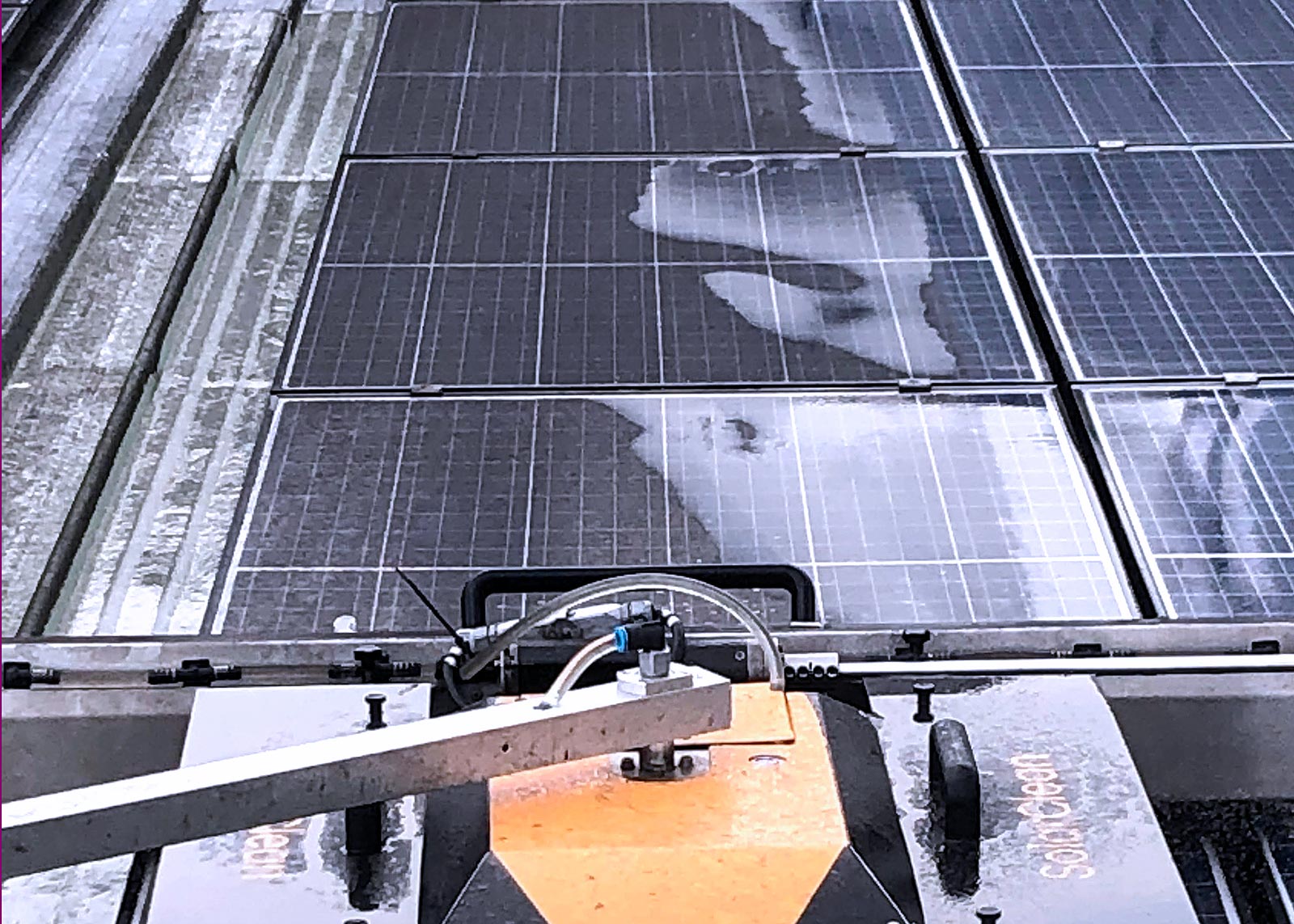 solar panels shining after being cleaned safely and without scratches by a mechanized robot