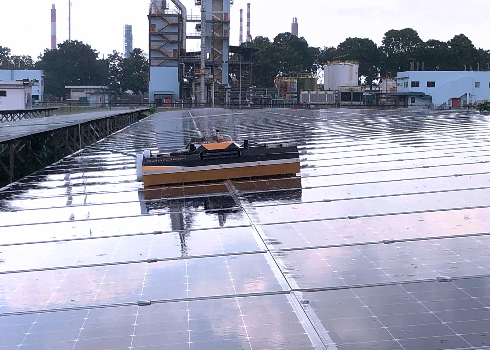 mechanized robot cleaning industrial and commercial solar panels